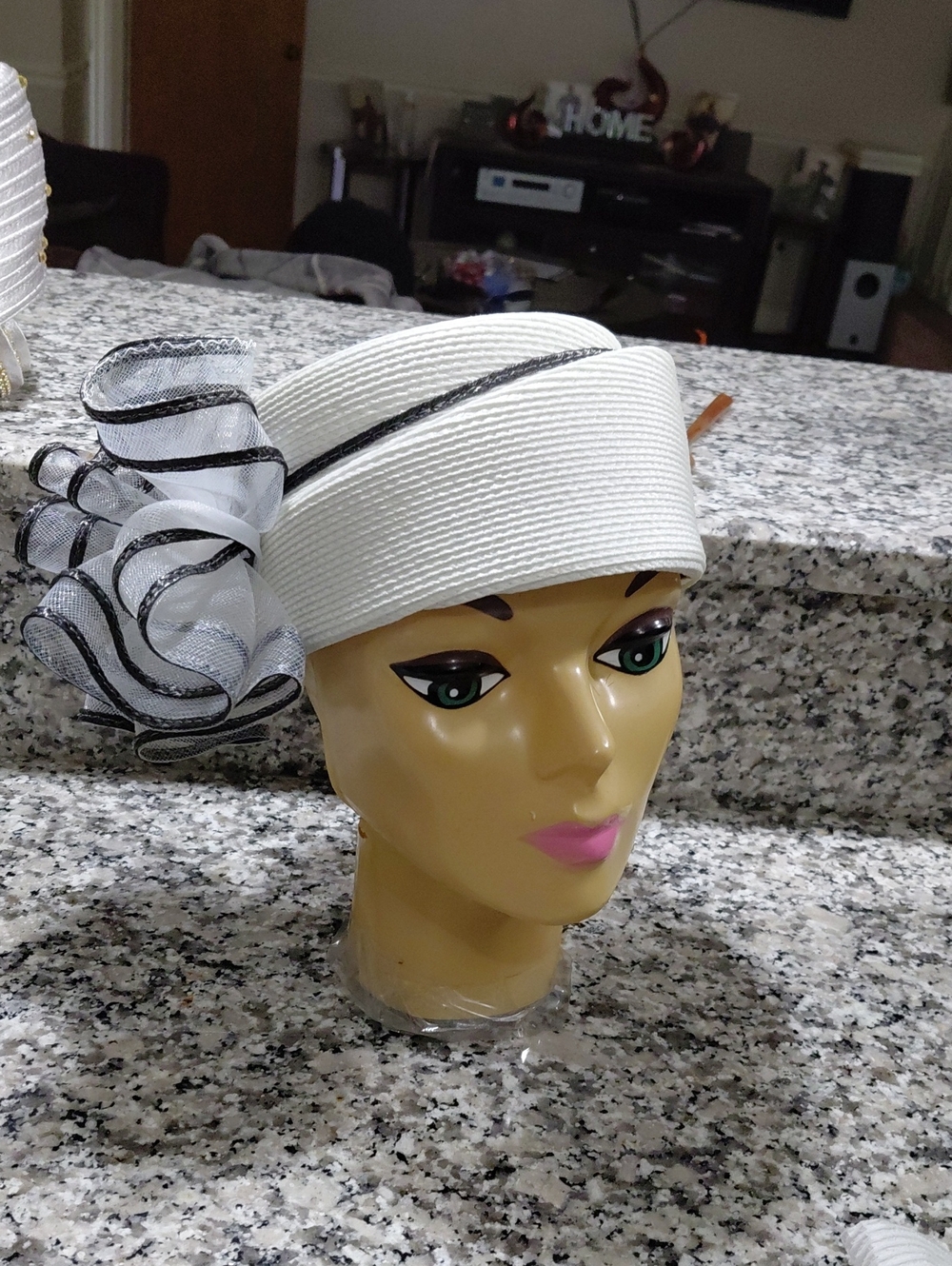 Elegant White Women's Fascinator Hat with Black Trim FAMOUS BRAND
